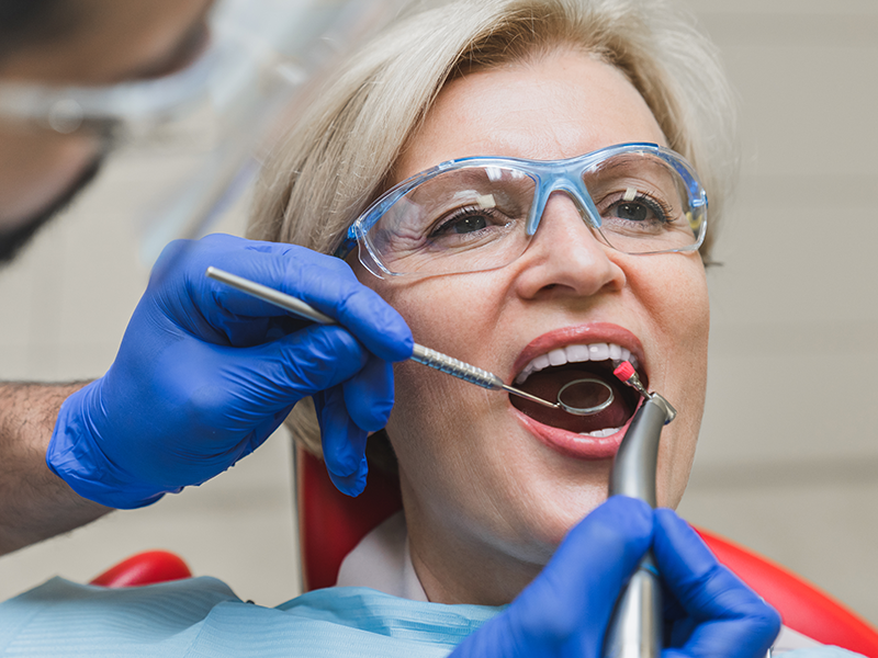 dental-services, Dental Fillings, image of a older woman getting fillings done at the dentist in Mira Mesa