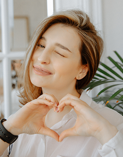 dentist near me, image of happy patient after getting dental work done in Mira Mesa